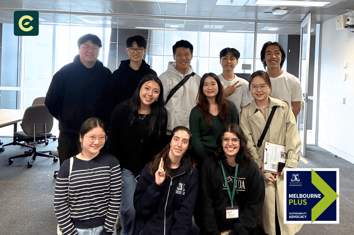 Group of people seated together at a cafe table