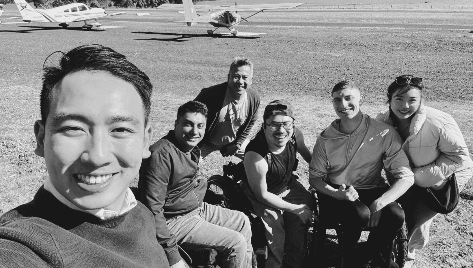 Black and white group photo outdoors